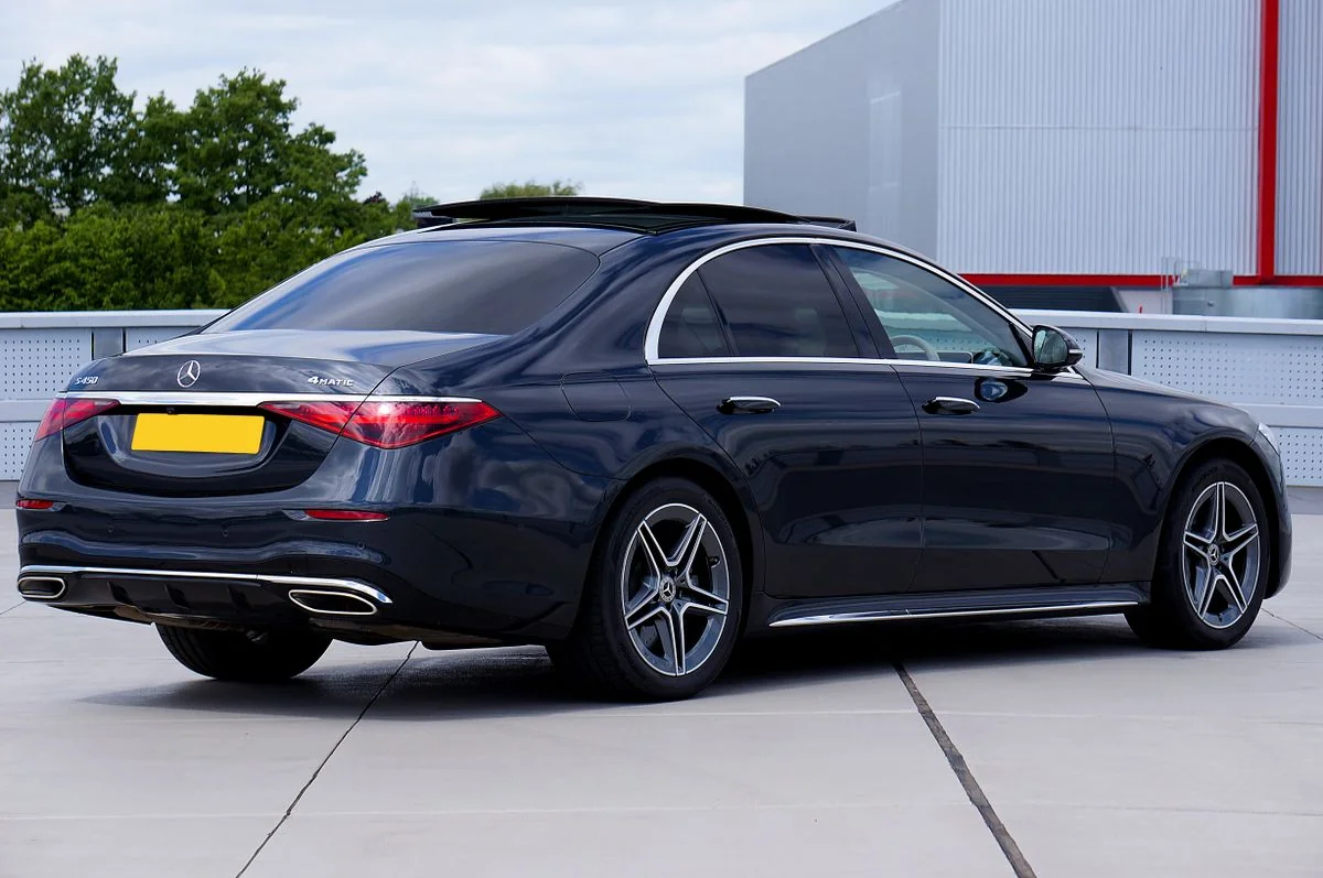 Black Mercedes-Benz S-Class sedan shown as a vehicle example